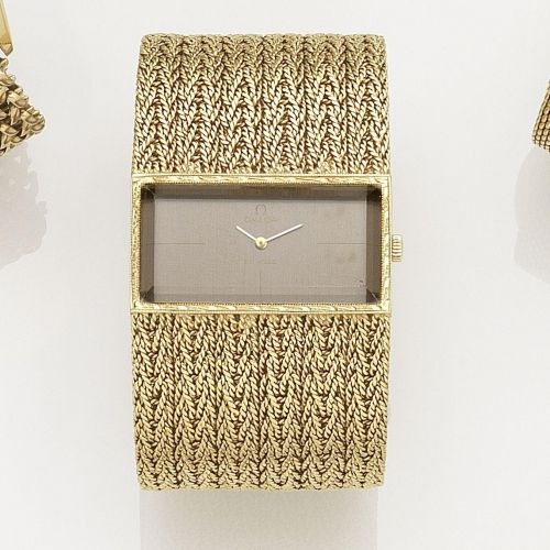 Omega. An 18k gold manual wind bracelet watch