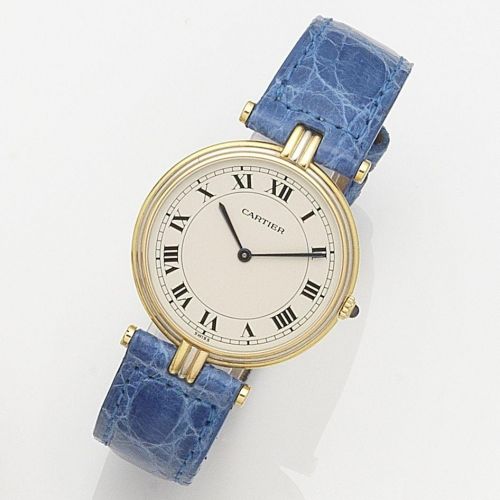 Cartier. An 18K three colour gold quartz wristwatch