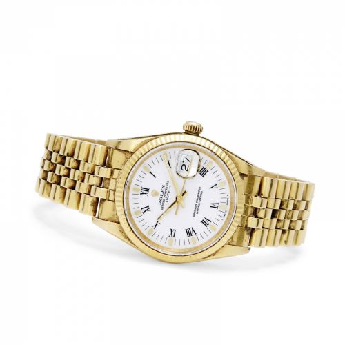Rolex. An 18K gold automatic wristwatch and bracelet