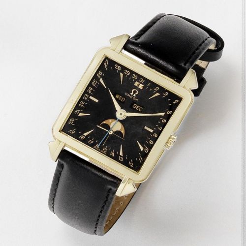 Omega. A fine and rare 18k gold manual wind calendar wristwatch with moon phase