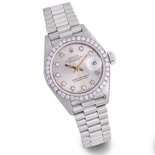 Rolex. A lady's 18K white gold and diamond set automatic calendar bracelet watch