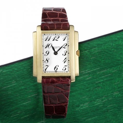 Patek Philippe. A lady's 18K gold quartz rectangular wristwatch