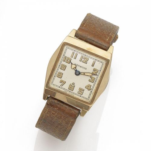 Harwood. A 14K gold automatic wristwatch