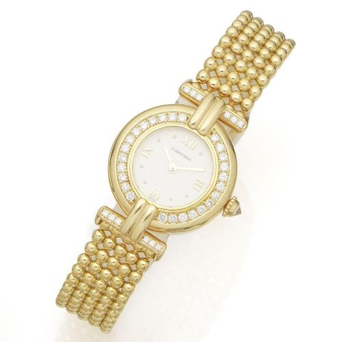 Cartier. A lady's 18K gold and diamond set quartz bracelet watch