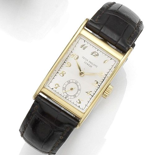Patek Philippe. An 18K gold manual wind wristwatch