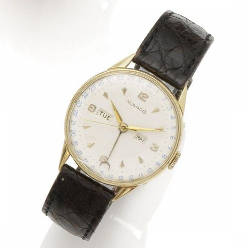 Movado. An 18K gold manual wind triple calendar wristwatch