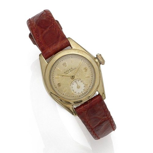 Rolex. A lady's 10K gold automatic wristwatch