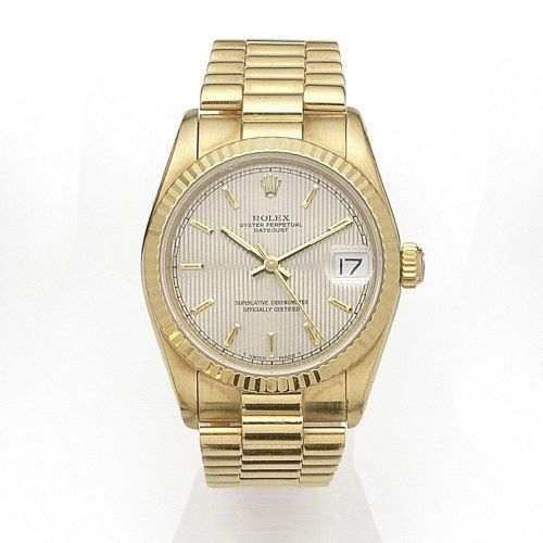 Rolex. A midsize 18K gold automatic calendar bracelet watch