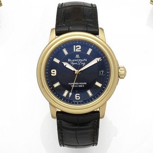 Blancpain. An 18K gold automatic calendar wristwatch