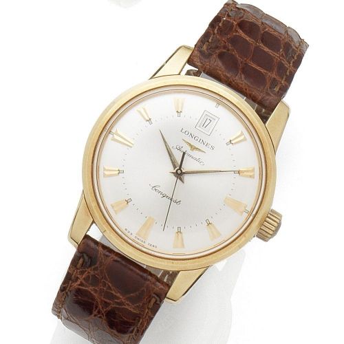 Longines. An 18K rose gold automatic calendar wristwatch