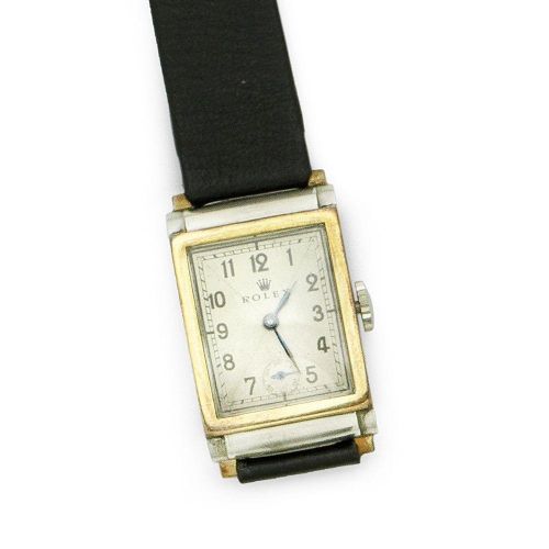 Rolex. A stainless steel manual wind rectangular wristwatch