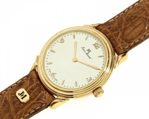 Jean Marcel. An 18K rose gold manual wind wristwatch
