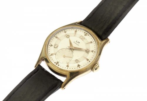 Lip. A gold plated and stainless steel manual wind wristwatch