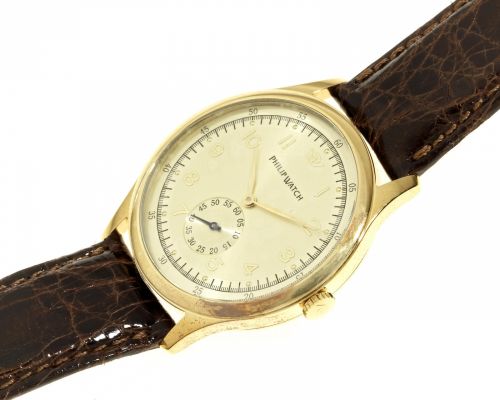 Philip Watch. An 18K gold manual wind wristwatch