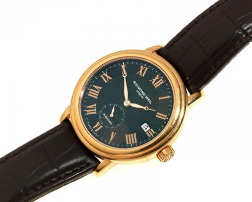 Raymond Weil. A gold plated automatic calendar wristwatch
