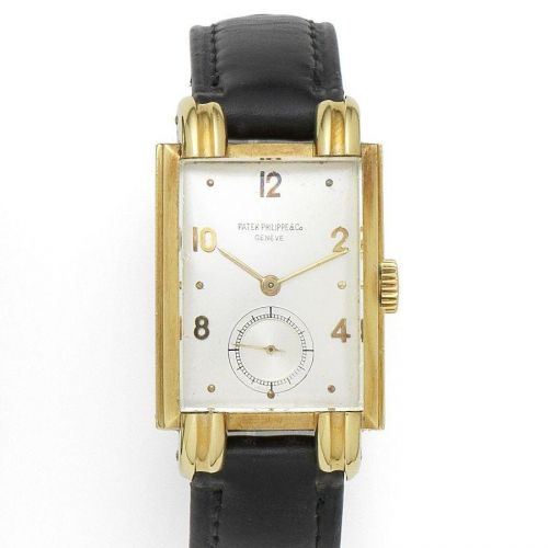 Patek Philippe. An 18K gold manual wind rectangular wristwatch