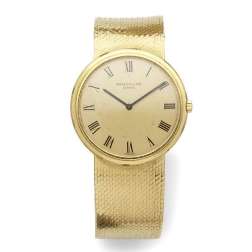 Patek Philippe. An 18K gold automatic bracelet watch