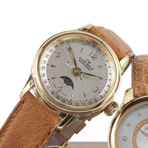 Claude Meylan. A lady's 18K rose gold manual wind triple calendar wristwatch with moon phase