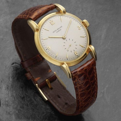 Patek Philippe. An 18K gold manual wind wristwatch with fancy lugs