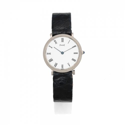Piaget. A midsize 18K white gold ultra-thin manual wind wristwatch
