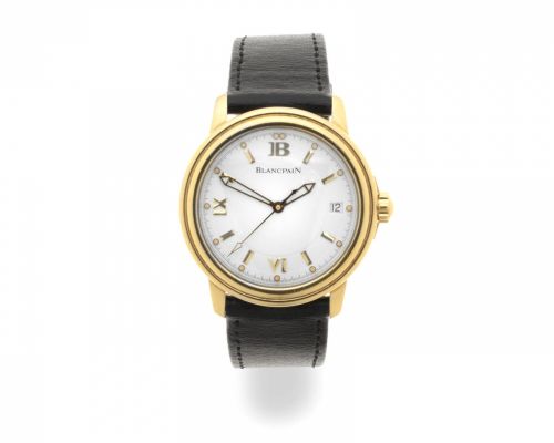 Blancpain. An 18K gold automatic calendar wristwatch