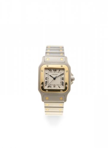 Cartier. A stainless steel and gold quartz calendar bracelet watch