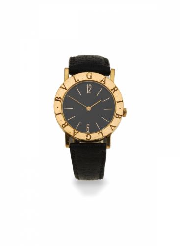 Bulgari. A midsize 18K gold quartz wristwatch