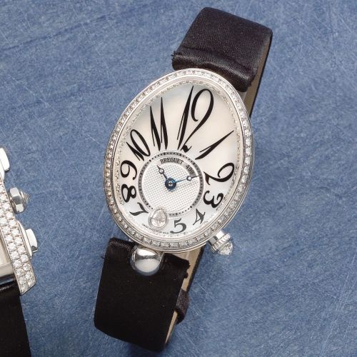 Breguet. A lady's fine 18K white gold and diamond set automatic wristwatch