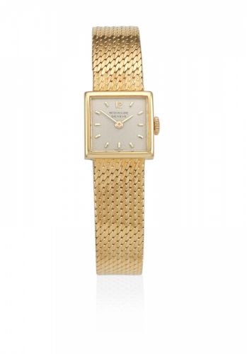 Patek Philippe. A lady's 18K gold manual wind bracelet watch