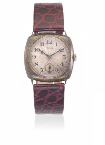 Rolex. A silver manual wind cushion form wristwatch