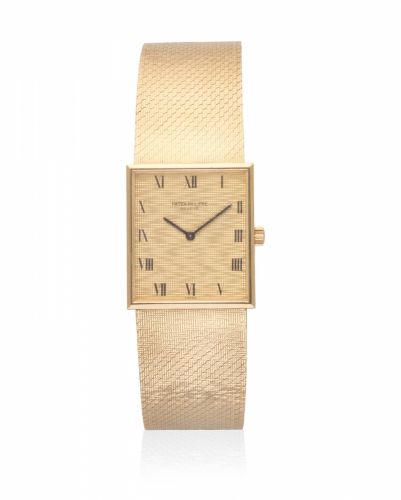Patek Philippe. An 18K gold manual wind rectangular bracelet watch