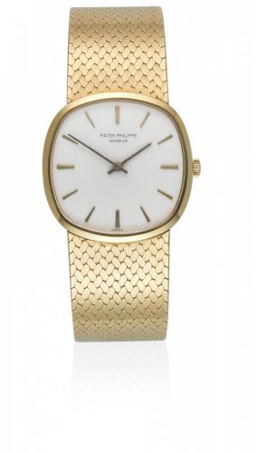 Patek Philippe. An 18K gold manual wind cushion form bracelet watch
