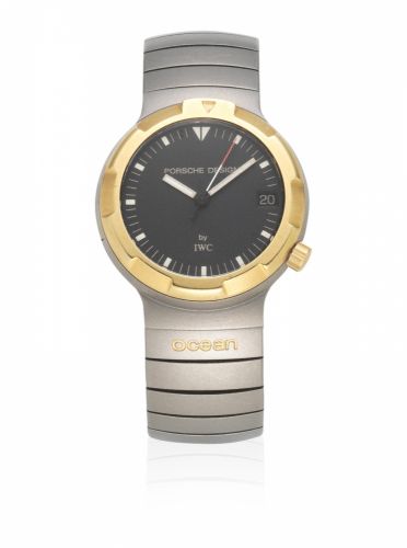 IWC for Porsche Design. A titanium and gold automatic calendar bracelet watch