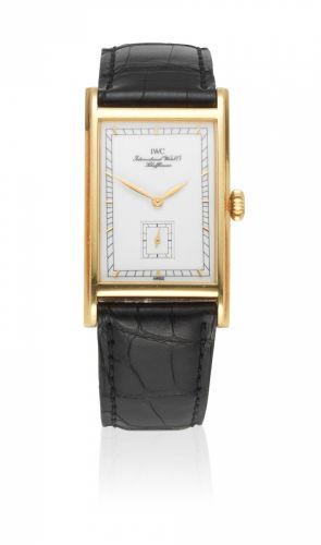 IWC. An 18K gold manual rectangular wristwatch