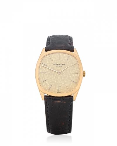 Patek Philippe. An 18K gold wristwatch