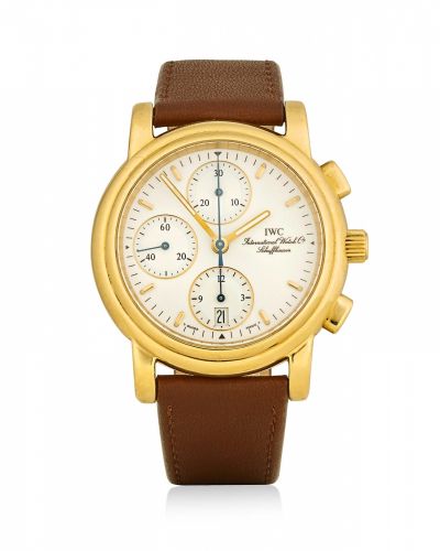 IWC. An 18K gold limited production automatic chronograph wristwatch with date