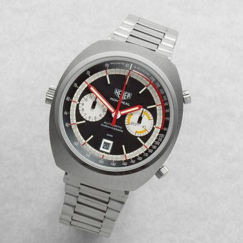 Heuer. A stainless steel automatic calendar chronograph bracelet watch