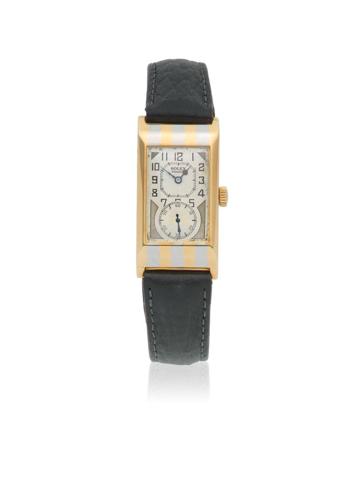 Rolex. A fine 18K striped white and yellow gold manual wind rectangular wristwatch