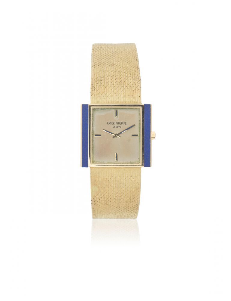 Patek Philippe. An 18K gold and lapis lazuli manual wind rectangular bracelet watch