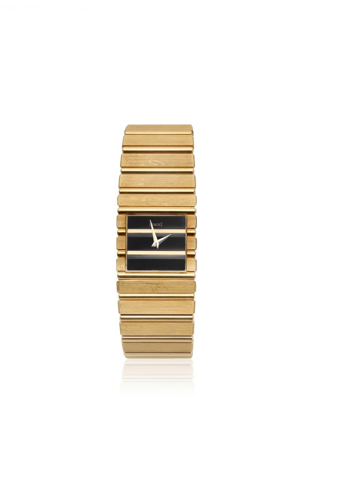 Piaget. An 18K gold manual wind bracelet watch with onyx dial