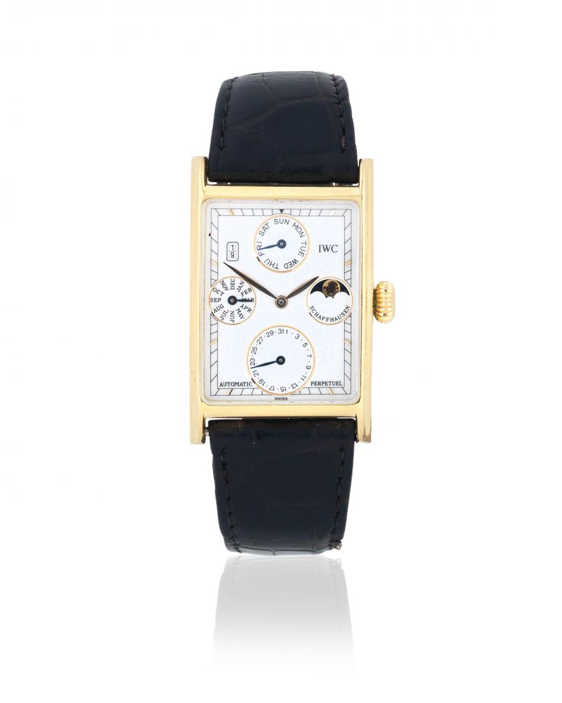 IWC. An 18K gold automatic perpetual calendar rectangular wristwatch with leap year indication