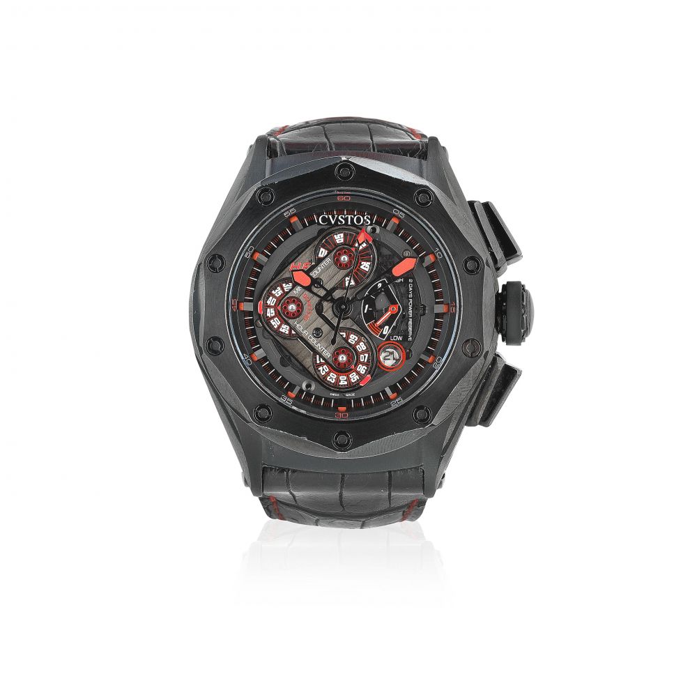 CVSTOS. A black coated stainless steel automatic calendar chronograph tonneau form wristwatch