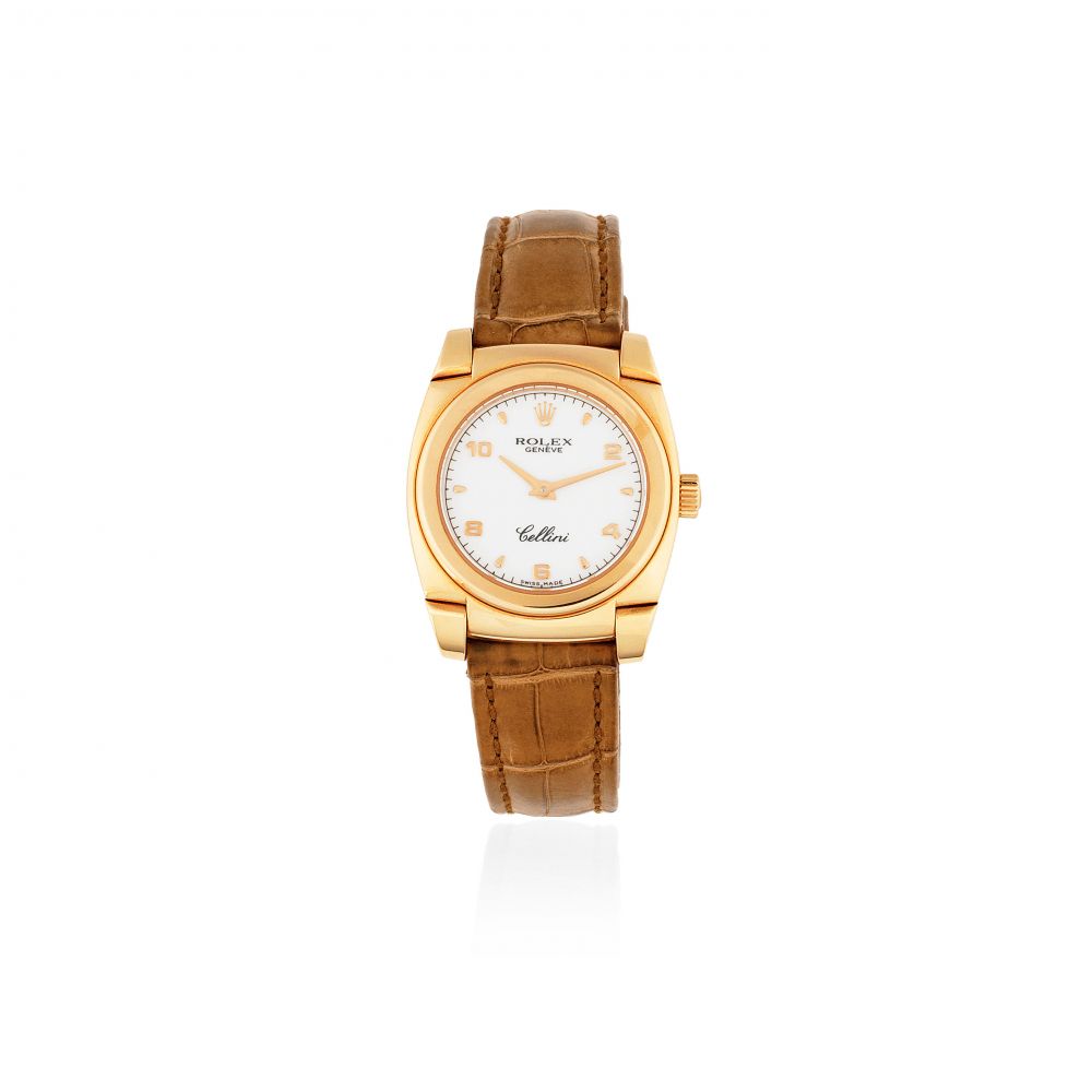 Rolex. A lady's 18K rose gold manual wind wristwatch