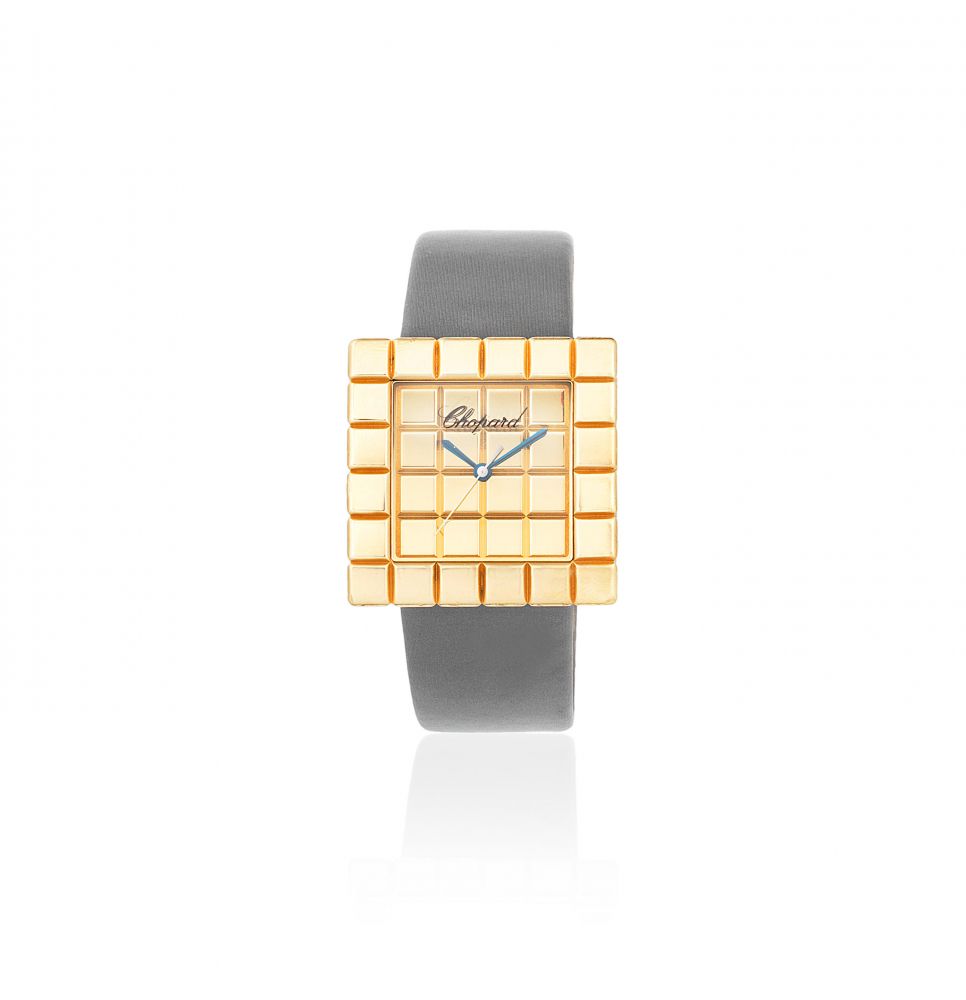 Chopard. A mid-sized 18K gold quartz square wristwatch