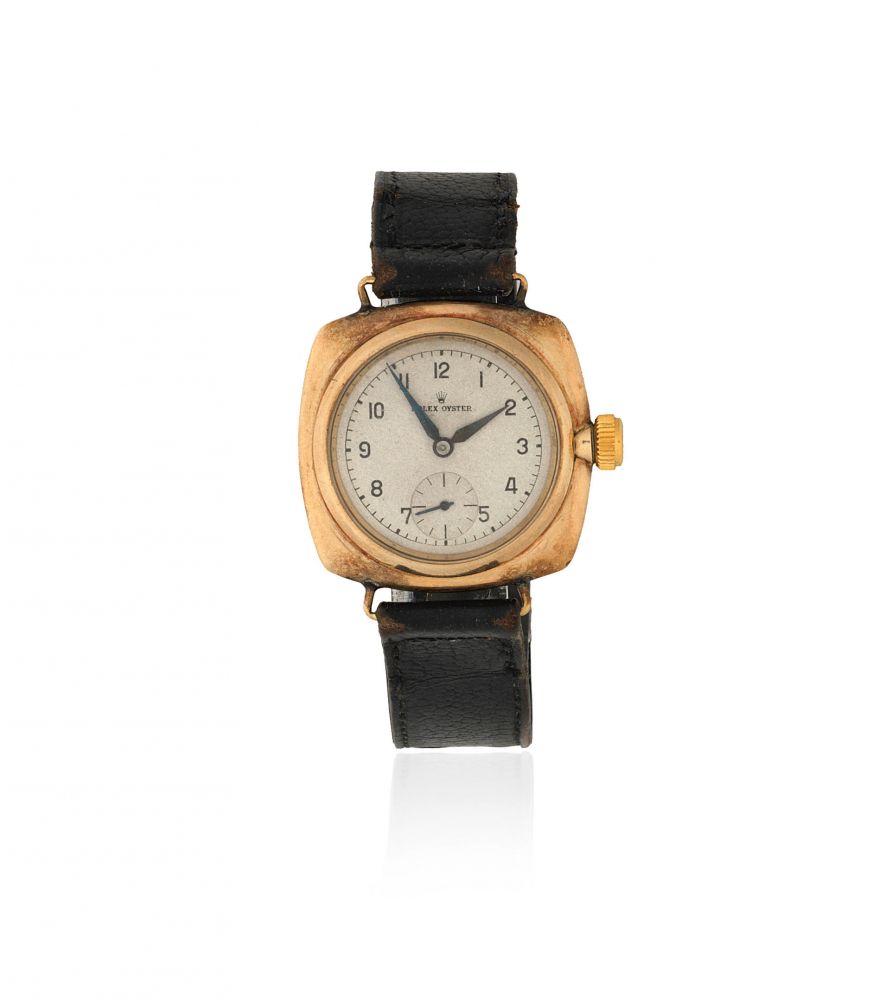 Rolex. A 9K gold manual wind cushion form wristwatch