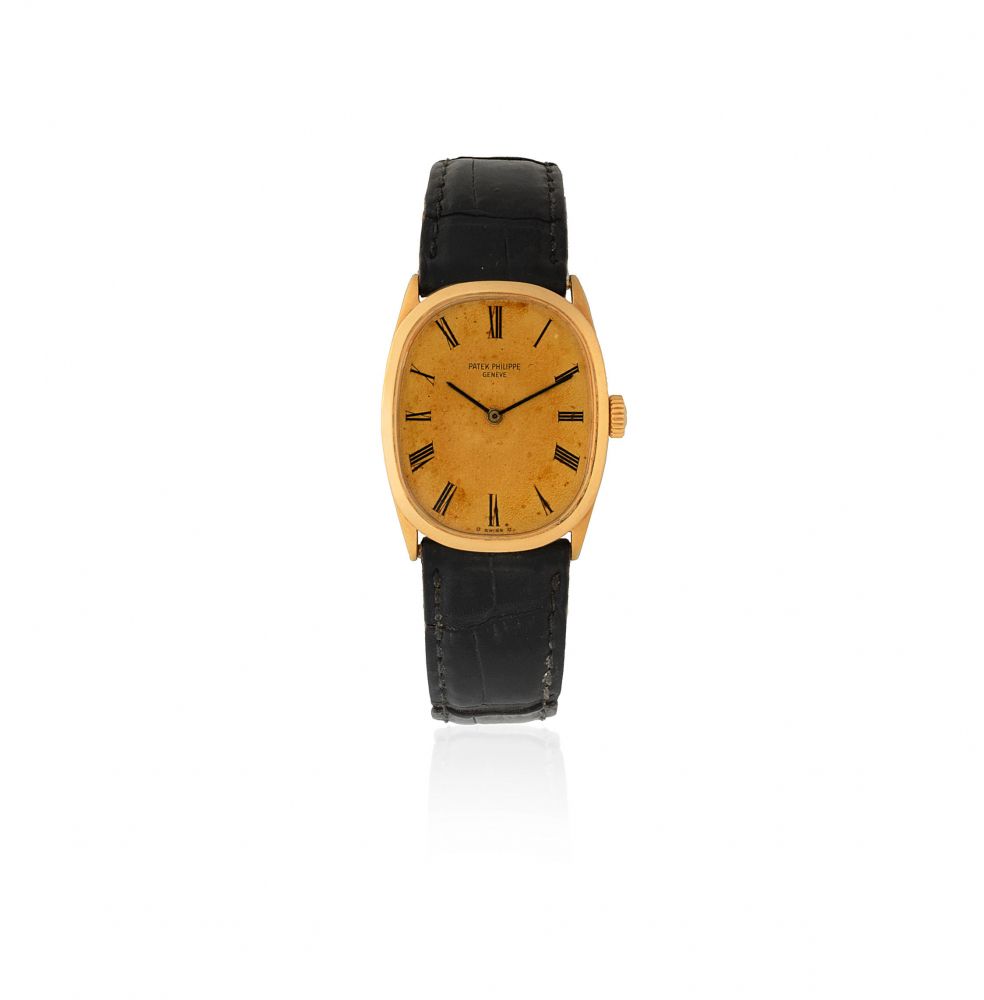 Patek Philippe. An 18K gold manual wind wristwatch formerly the property of Alan Whicker