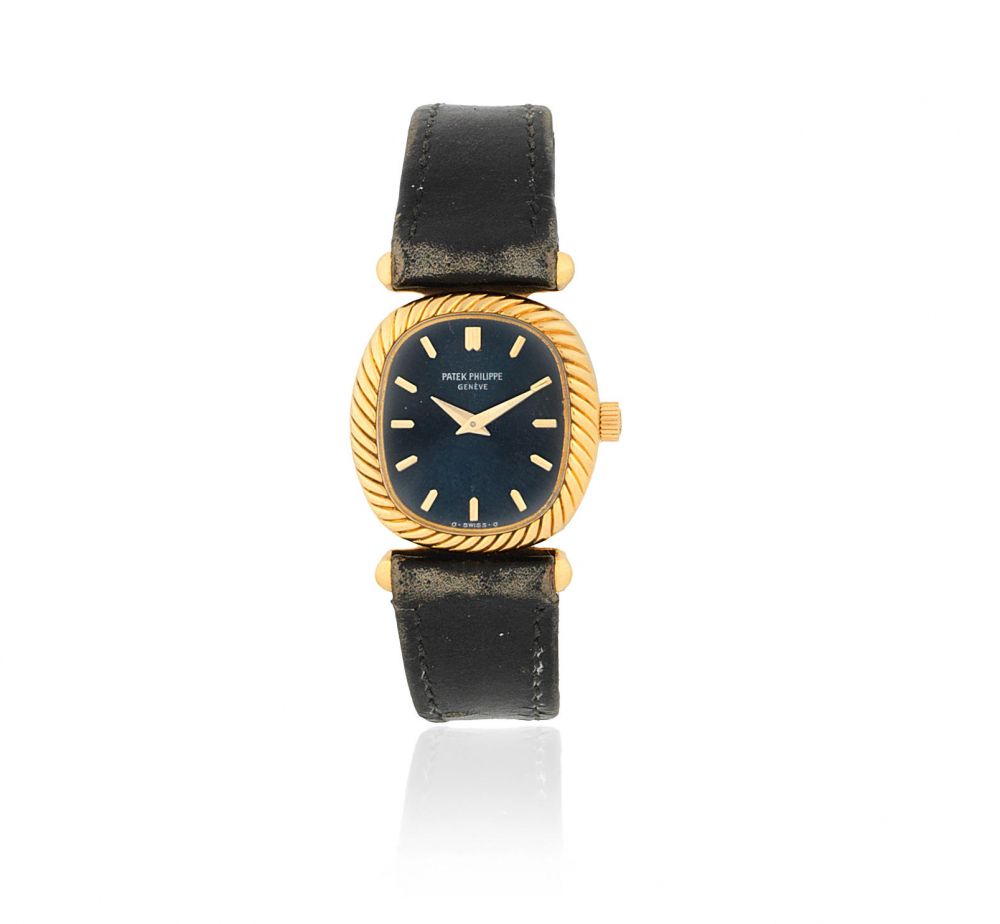 Patek Philippe. A lady's 18K gold manual wind oval wristwatch