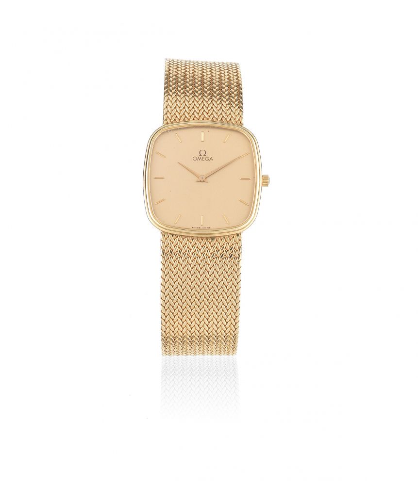 Omega. A 9K gold quartz cushion form bracelet watch