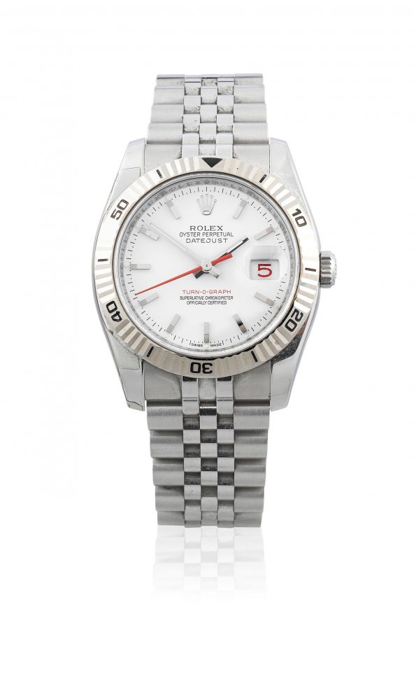 Rolex. A stainless steel and white gold automatic calendar bracelet watch