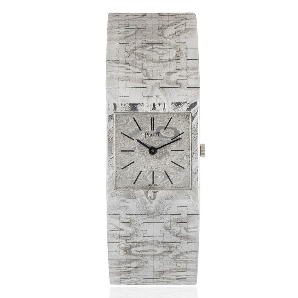 Piaget. A lady's 18K white gold manual wind square bracelet watch